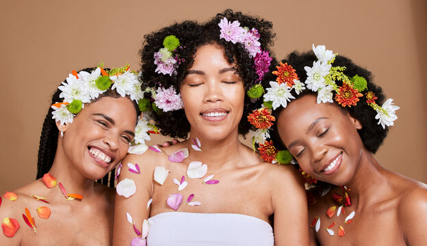Beauty, diversity and flowers for natural hair and skincare in studio with women friends together for luxury spa and dermatology mockup. Aesthetic black women happy about organic spring plant product