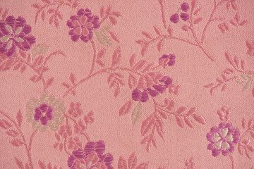 Part of the old japanese fabric pattern on pink color background.