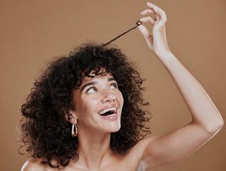 Hair care, beauty and happy woman with afro in a studio for a health, clean and curly treatment....