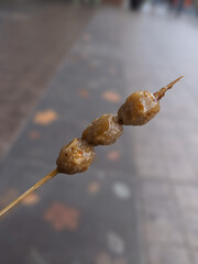 Small grilled meatballs. Local Street Food in Indonesia