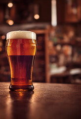 a Glasses of beer on a wood table