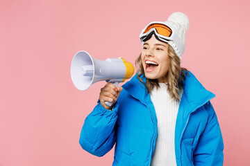 Snowboarder fun woman wear blue suit goggles mask hat ski padded jacket hold scream in megaphone...
