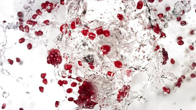Slow Motion of Explosion Pomegranate Seeds and Burst Water