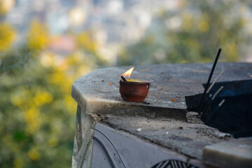 burning candle in the garden
