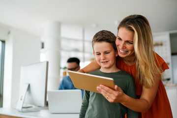 Distance learning, online education, home work concept. Family with digital devices at home.
