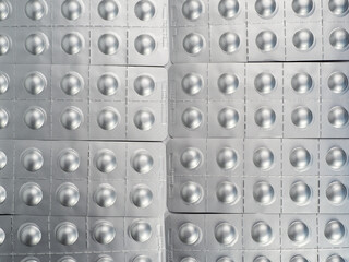 Medical silver blasters. Background from medical blasters. Tablets in a package.