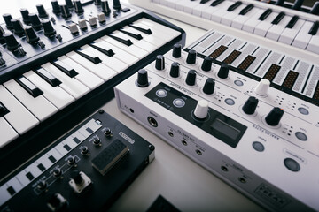 Synthesizers keyboards on white background