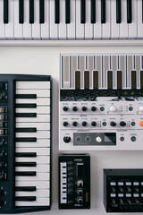 Synthesizers keyboards on white background