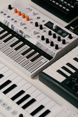 Synthesizers keyboards on white background