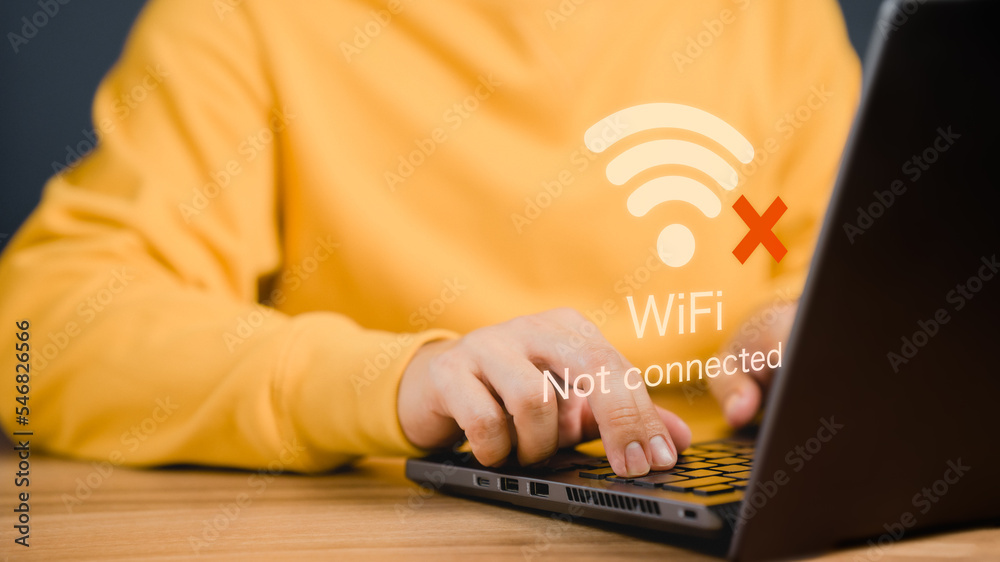 Poster Man using a computer laptop to connect to wifi but wifi not connected, and waiting to loading digital business data form website, concept technology of waiting for connect to wifi.