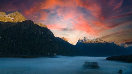 The mountain view of autumn scene and  foggy in the  morning with sunrise sky scene at fiordland national park