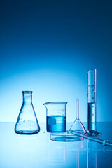 laboratory flask with blue liquid