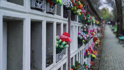 Flowers on a grave at cemetery