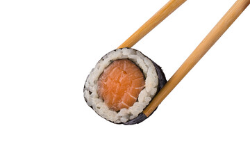 chinese chopsticks hold roll with red fish, isolated on white background