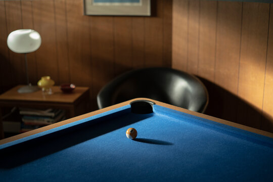 Ball in shadow on pool table