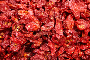 Dry cherry tomatoes as food background. Tomato Ciliegino di Pachino. Tomatoes of Pachino from southeast coast of Sicily, Italy