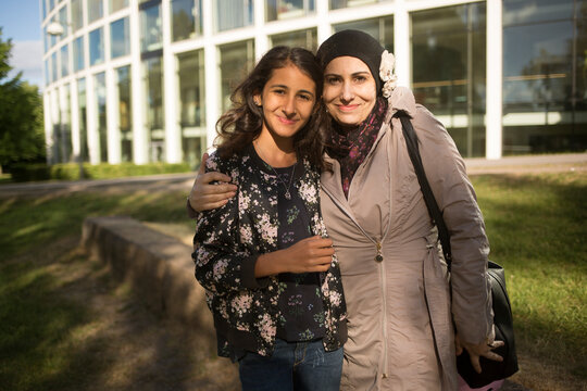 Woman and daughter in park
