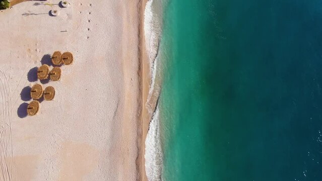 Long beach and vacation holiday hotels for tourists on coast of Adriatic sea in Albania.