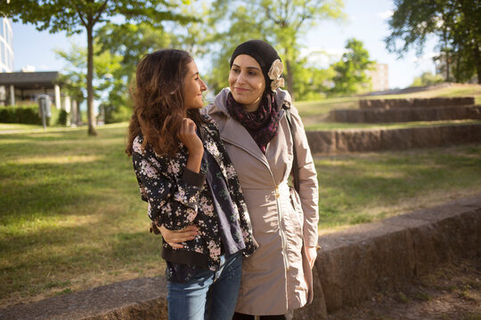 Woman and daughter in park
