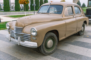 Vintage passenger car. Antique equipment. Transport in the last century.