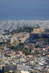 Fototapeta na wymiar Aerial view of the city with hill of Acropolis of Athens from the Mount Lycabettus, Athens, Greece