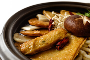 fish cake hotpot on white background