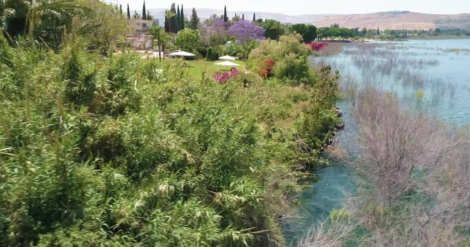 Israel, Sea of Galilee, Kinneret Academic college - 8 MAY 2022: Aerial View of a college building by the lake,.