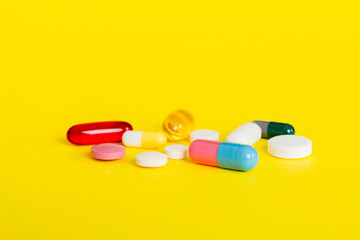 Many different colorful medication and pills perspective view. Set of many pills on colored background