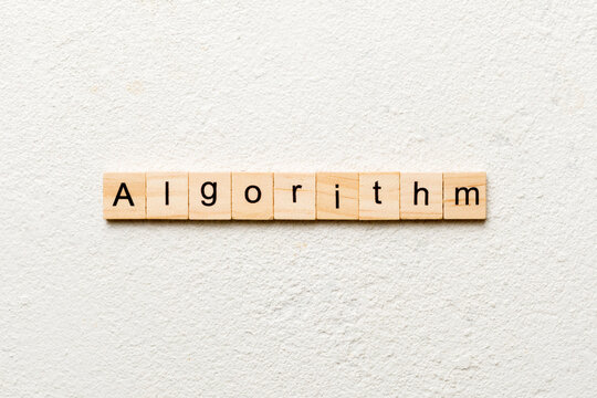 Algorithm word written on wood block. Algorithm text on table, concept