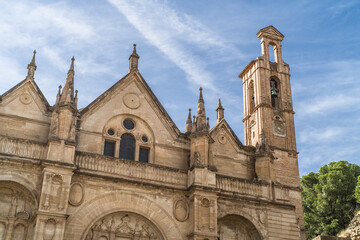 Fototapeta na wymiar the historic brick and stone building of the Real Collegiata de Santa María la Mayor. horizontal, daylight