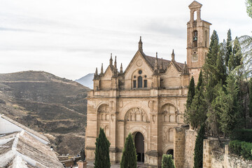 the historic brick and stone building of the Real Collegiata de Santa María la Mayor. horizontal, daylight