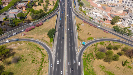 Aerial view of the Great Ring Junction in Rome, Italy. It's a long orbital motorway that encircles...
