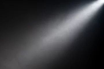 Dekokissen Close up of light beam isolated on black background © rangizzz