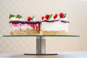 fruit cake with marmalade and whipped cream