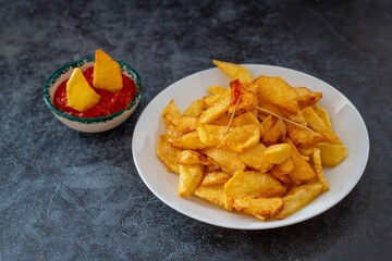 Fried potato wedges. Fast food. isolated on white