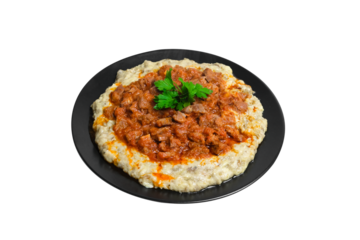 Sultans Delight from Ottoman Cuisine. Lamb Stew Served on a Bed of Aubergine Puree . Turkish Food Hunkar Begendi isolated white background