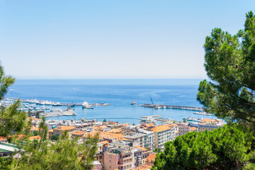Naklejka premium High angle view of the city of Sanremo. On the background Ligurian Sea. Copy space.