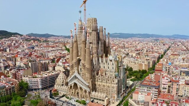 Landscape of Barcelona panorama from above aerial view shot drone La Sagrada Familia cathedral temple church in Spain historical unfinished buildings old town in Europe beautiful European cityscape