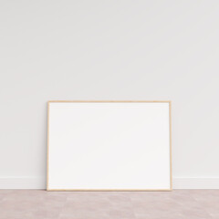 Empty picture frame on wooden floor leaning against wall. Blank poster frame standing on wooden floor. Blank poster frame mockup. Empty picture frame mockup. 3d rendering.