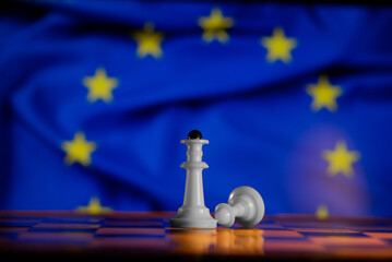 Chess against the background of the flags of the European Union