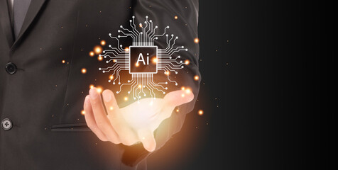 Businessman holding the holographic AI. Artificial intelligence with machine deep learning concept.