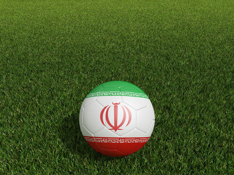 Football in Iran flag  on  green grass.  3d rendering