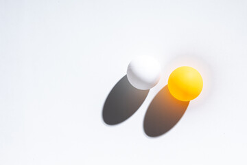 Table tennis balls on white background