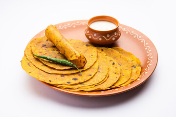 Methi Thepla is a Gujarati flatbread similar to paratha, made of whole wheat flour, oil, spices.