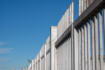 Borders: the fence with steel metal grate. Detail of the grate is made with a resistant and solid structure which increases the safety of the premises