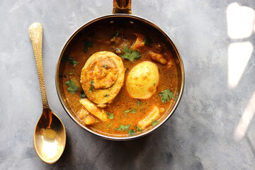 Egg Curry or Anda masala gravy, baida curry. Indian spicy food. Indian nonvegetarian Homemade food. Perfect Indian lunch. over moody background with copy space.
