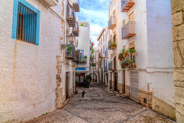 Fototapeta na wymiar Old town Peniscola narrow streets within the castle walls Castellon province Costa del Azahar Spain