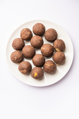Nachni laddu or Ragi laddoo or sweet balls made using finger millet, jaggery and ghee