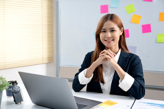 young businesswoman friendly smile at work