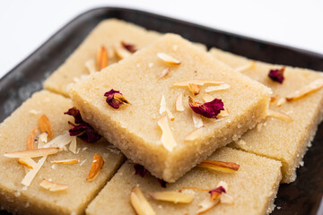 Rava barfi or sooji burfi or barfee is an Indian Sweet made with semolina, sugar, ghee and almonds